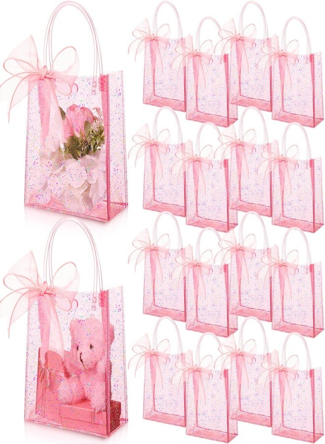 Sayglossy أكياس هدايا شفافة وردية اللون من Sayglossy، 24 قطعة، بمقابض، مقاس 6.1 × 5.9 × 2.8 بوصة، حقائب حمل شفافة لامعة مزينة بشرائط، أكياس تغليف هدايا قابلة لإعادة الاستخدام مصنوعة من مادة PVC، مثالية لحفلات استقبال المولود الجديد، وحفلات توديع العزوبية، وأعياد الميلاد. - Image 1